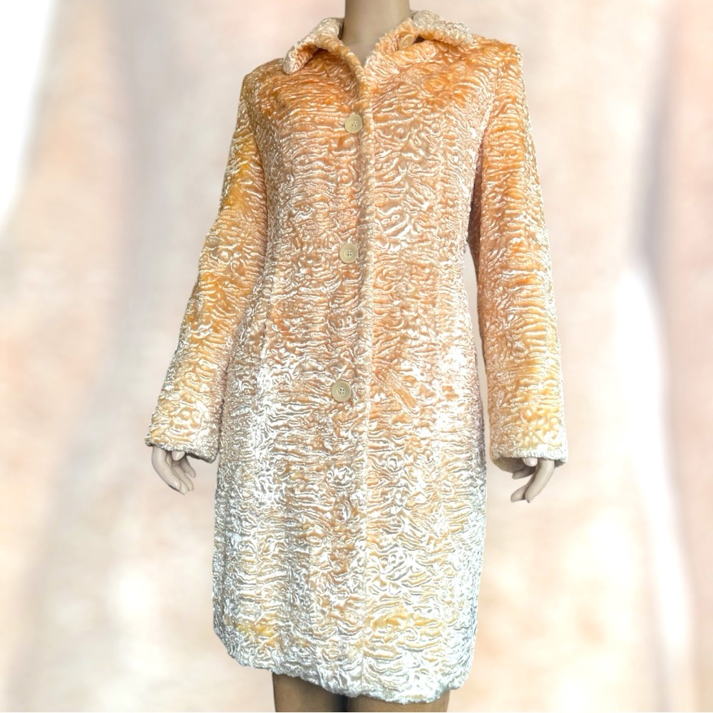 Valerie Steven’s Beige Faux Fur Coat